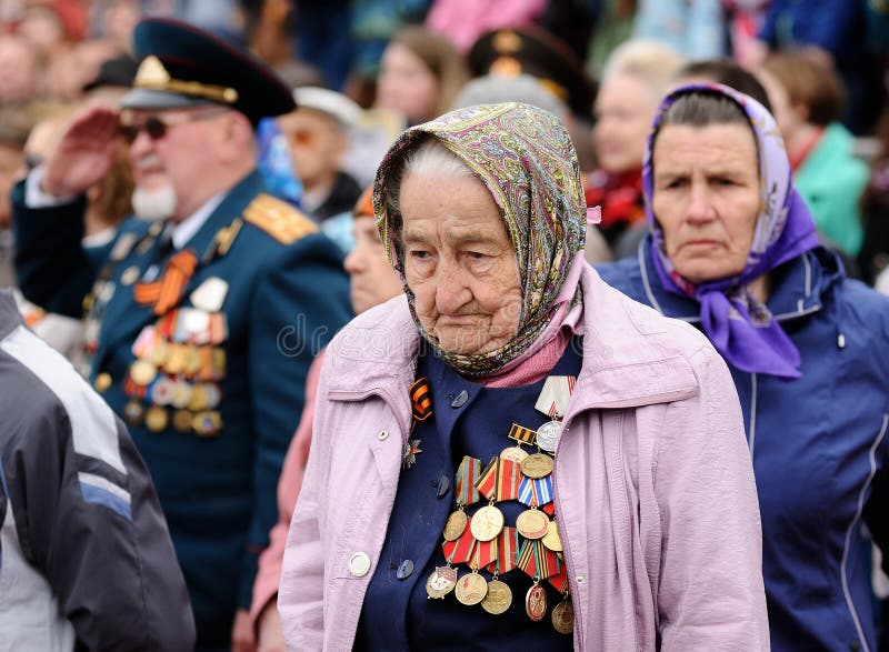 Orel, Russia - May 9, 2017: Celebration of 72th anniversary of the Victory Day WWII. Senior war veterans with medals and awards on uniform closeup. Orel, Russia - May 9, 2017: Celebration of 72th anniversary of the Victory Day WWII. Senior war veterans with medals and awards on uniform closeup