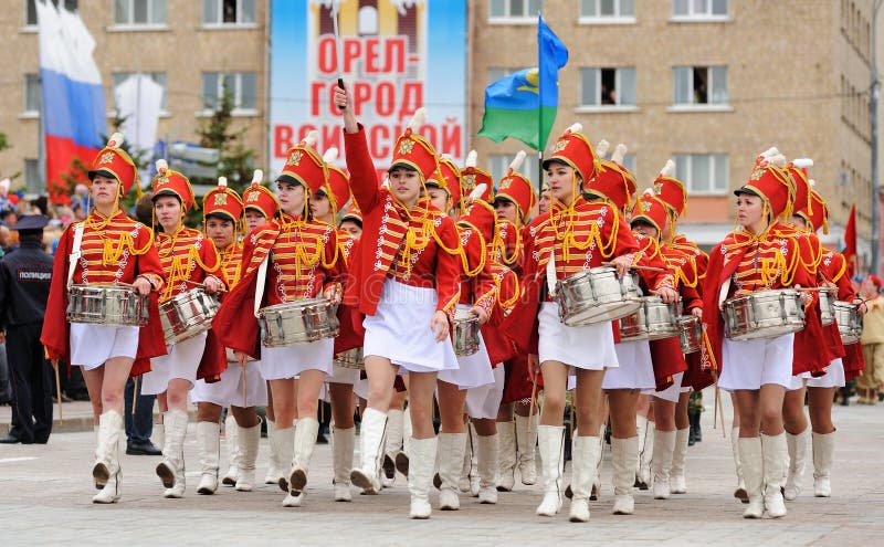 Orel, Russia - May 9, 2017: Victory Day selebration. Young pretty girls in hussar uniform marching with drums horizontal. Orel, Russia - May 9, 2017: Victory Day selebration. Young pretty girls in hussar uniform marching with drums horizontal