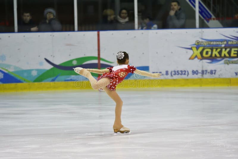 Orenburg, Russia - March 31, 2018 year: Girls compete in figure skating stock photo Orenburg, Russia - March 31, 2018 year: Girls compete in figure skating stock photo