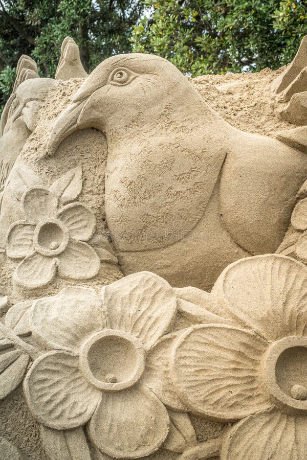 OREWA, NZ - MAR 23: Sand Sculpture of a Wood Pigeon at the Orewa Sand Castle Competition Mar 23 2019 royalty free stock image OREWA, NZ - MAR 23: Sand Sculpture of a Wood Pigeon at the Orewa Sand Castle Competition Mar 23 2019 royalty free stock image