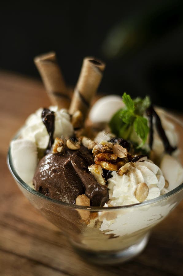 Chocolate and mint vanilla ice cream sundae dessert in bowl stock photos Chocolate and mint vanilla ice cream sundae dessert in bowl stock photos