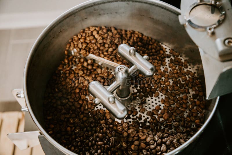 Organic Coffee Beans Roasting in an Industrial Coffee Bean Roaster and