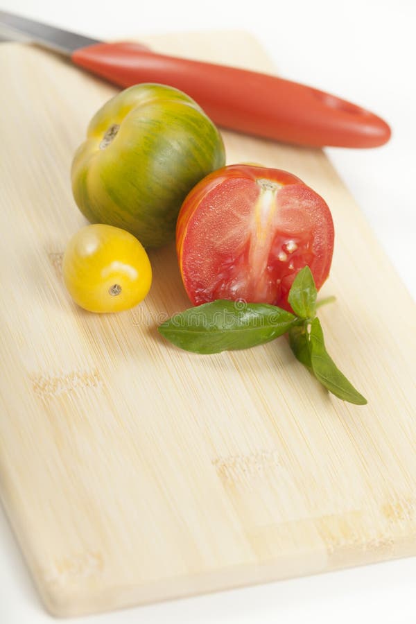 Organic Heirloom Tomatoes stock image. Image of produce 25040345