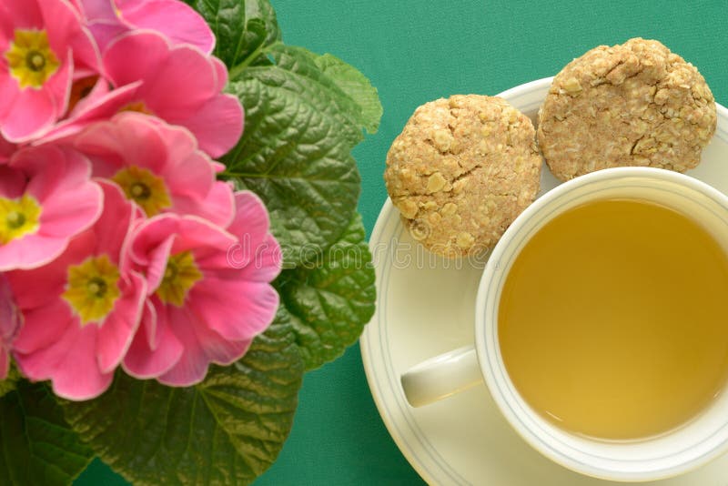 Organic herbal tea and homemade cookies flowers