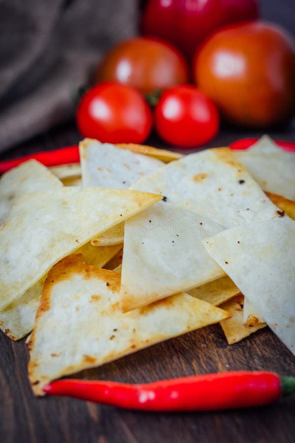 Organic Mexican Snack Nachos Corn Chips with Vegetables. Stock