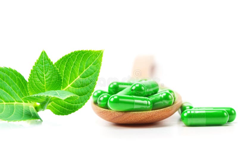 Organische kruiden groene geneeskundecapsule royalty-vrije stock foto Organische kruiden groene geneeskundecapsule royalty-vrije stock foto