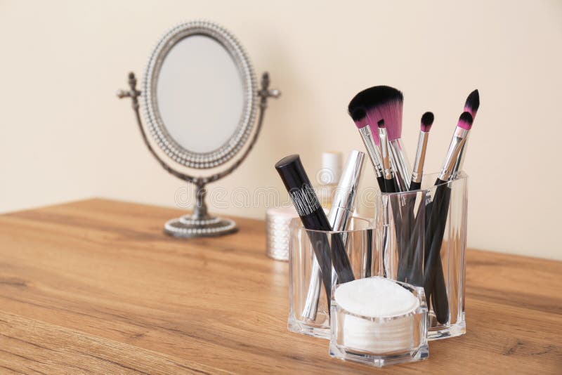 Organizer with Cosmetic Products for Makeup and Mirror on Table Stock Photo Image of mascara