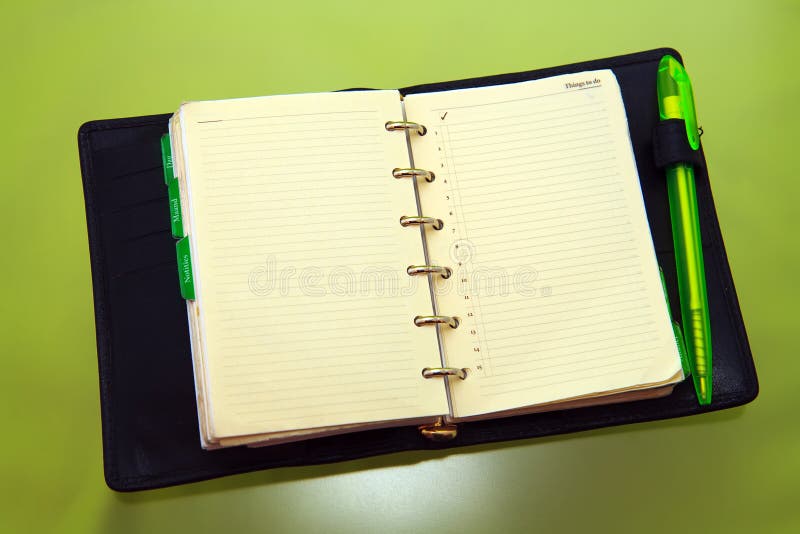 Organizer with green pen