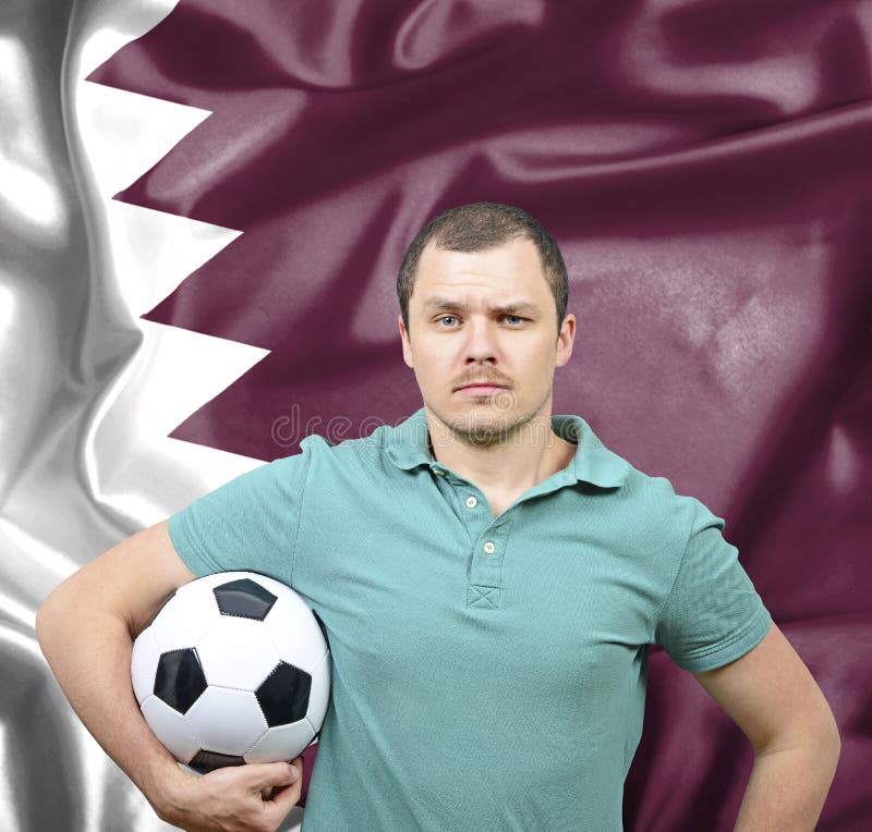 Orgulloso hincha de fútbol de Qatar foto de archivo libre de regalías Orgulloso hincha de fútbol de Qatar foto de archivo libre de regalías