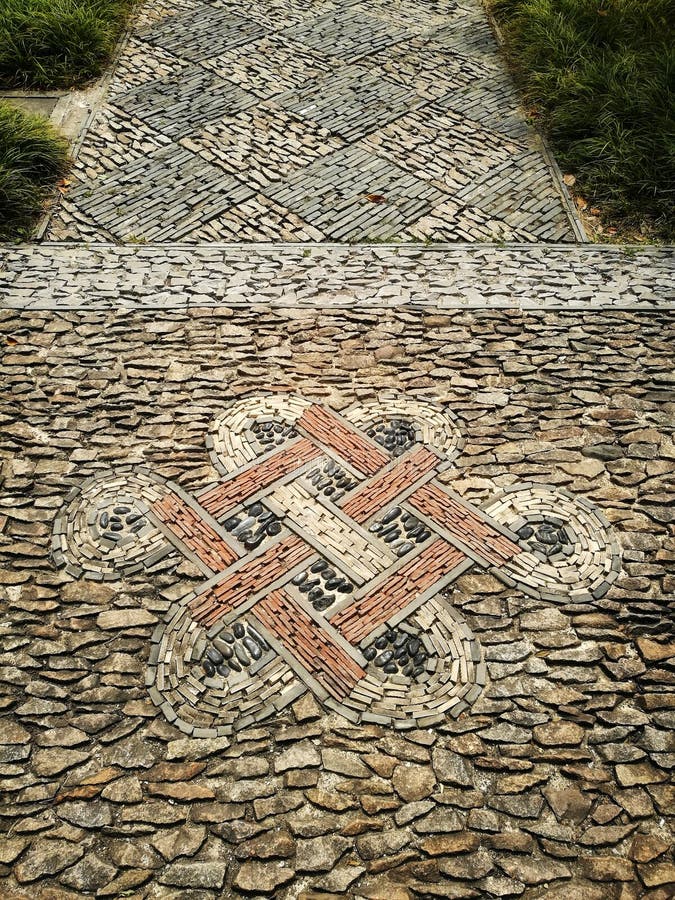 Oriental foot path tiles design in ancient Chinese garden