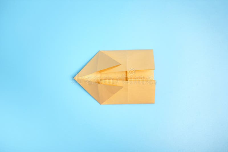 Origami Bunny Step by step Photo Instruction On A Blue Background 