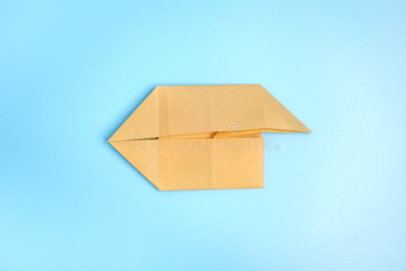 Origami Bunny Step by step Photo Instruction On A Blue Background 