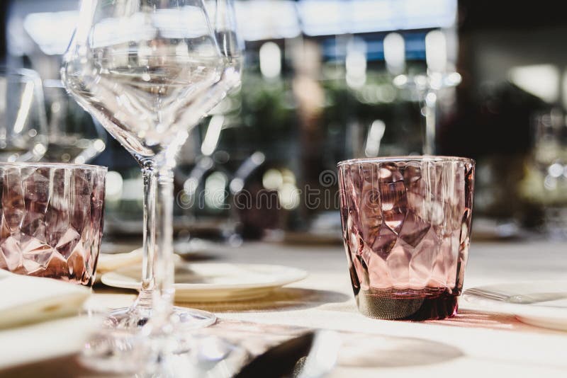 Original empty cutlery with elegant water glasses stock photography