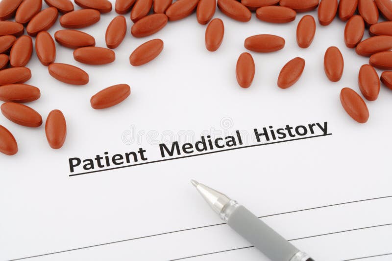 Patient medical history document with pills and pen. Patient medical history document with pills and pen