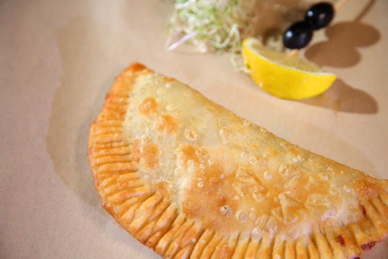 Original Serving of Meat Pie in a Restaurant.Argentinian Empanada