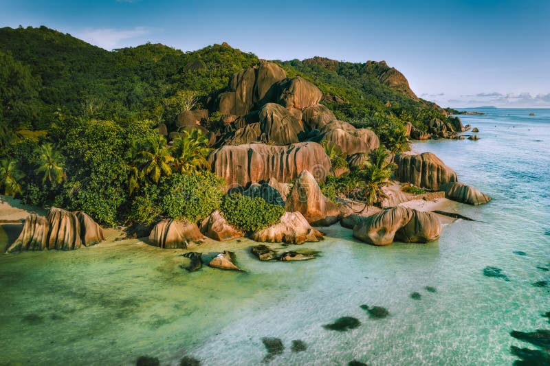 Anse Source D argent beautiful famous beach at La Digue Island, Seychelles. Aerial drone photo from above. Anse Source D argent beautiful famous beach at La Digue Island, Seychelles. Aerial drone photo from above.