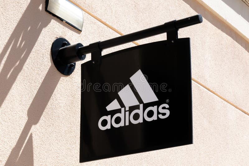 Orihuela Costa, Alicante, Spain - April 2023: Adidas Sign on Wall of Adidas Store. Adidas is Multinational Editorial Image - Image wear, shop: 275464520