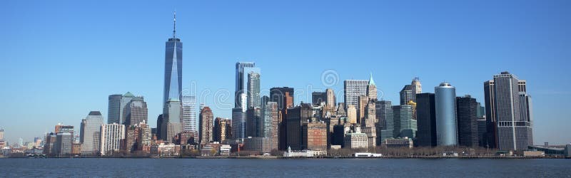 Orizzonte di Manhattan ed un centro di commercio mondiale immagine stock Orizzonte di Manhattan ed un centro di commercio mondiale immagine stock
