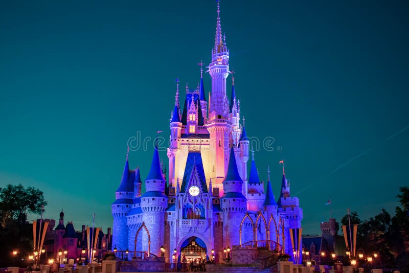 Panoramic view of illuminated Cinderella`s Castle on blue night background in Magic Kingdom at Walt Disney World 2