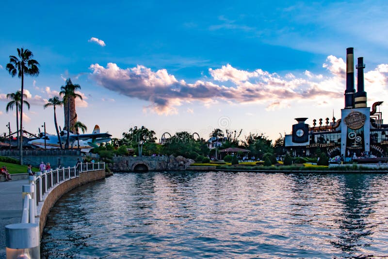 Panoramic view of vintage plane, Island of Adventure lighthouse and Chocolate Emporium restaurant at Universal Studios area . stock photography Panoramic view of vintage plane, Island of Adventure lighthouse and Chocolate Emporium restaurant at Universal Studios area . stock photography