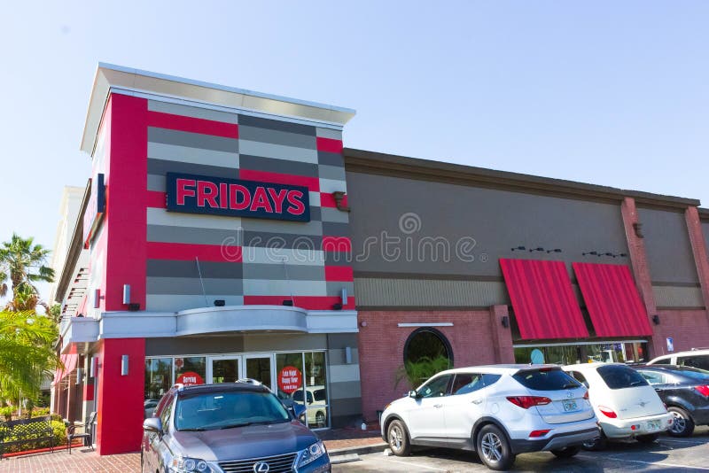 Orlando, USA - May 8, 2018: TGI Fridays exterior and logo. TGI Fridays is an American restaurant chain focusing on casual dining.