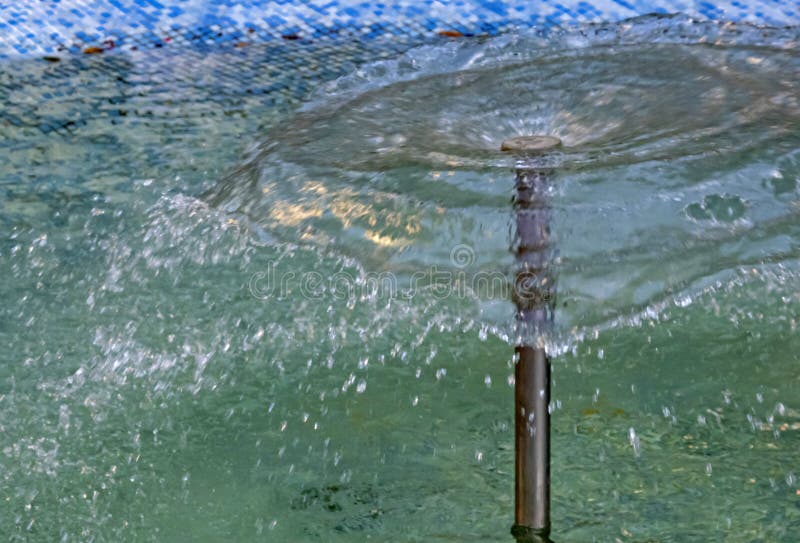 Close up ornamental pool,clear water and fountain. Fountain waterfall clear stock images, royalty-free photos and pictures