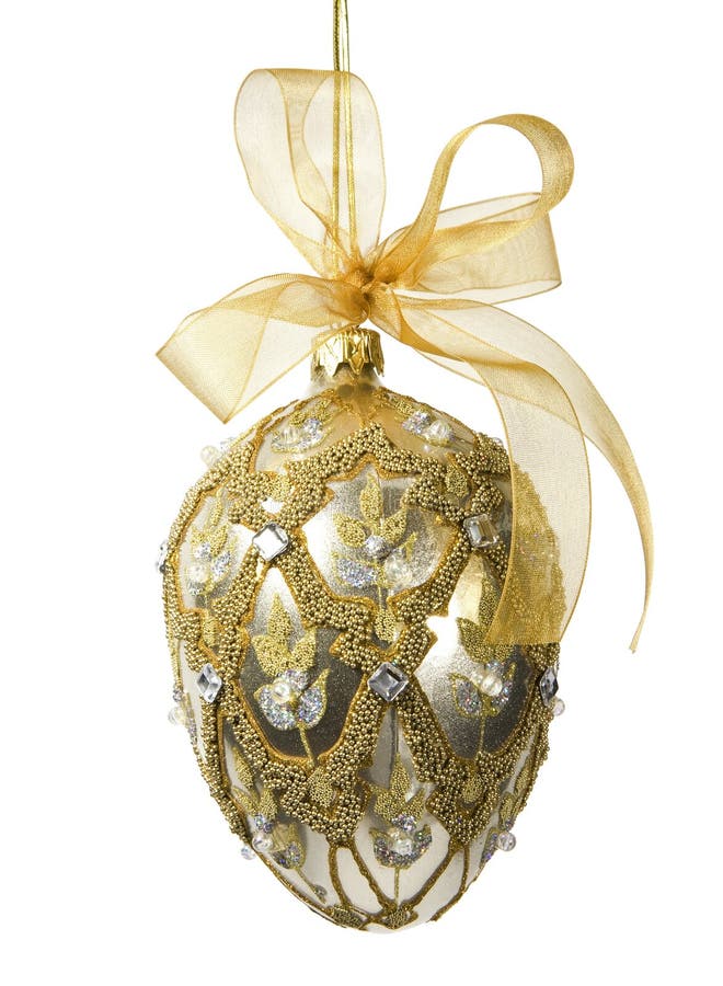 Elegant gold and silver bejeweled egg-shaped ornament with gold mesh bow (includes clipping path). Elegant gold and silver bejeweled egg-shaped ornament with gold mesh bow (includes clipping path).