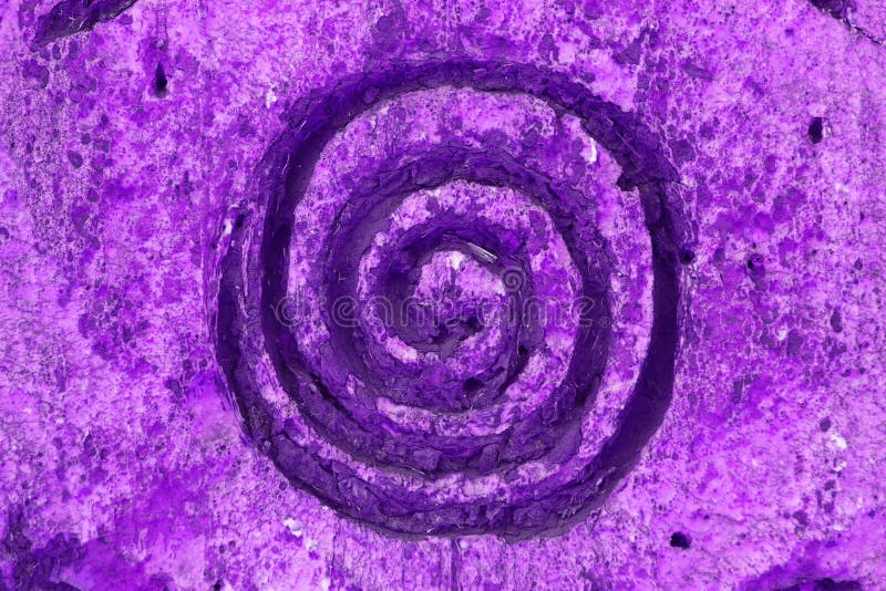 Background of purple wind vortex spiral ornament on the wall in high resolution. Background of purple wind vortex spiral ornament on the wall in high resolution