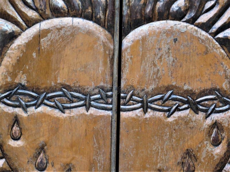 Detail of ornate carved doors, Chimayo, New Mexico royalty free stock photo Detail of ornate carved doors, Chimayo, New Mexico royalty free stock photo
