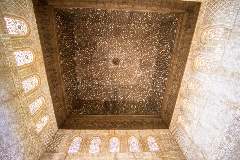 Ornate ceiling carvings in Alhambra palace Granada, Spain stock photo Ornate ceiling carvings in Alhambra palace Granada, Spain stock photo