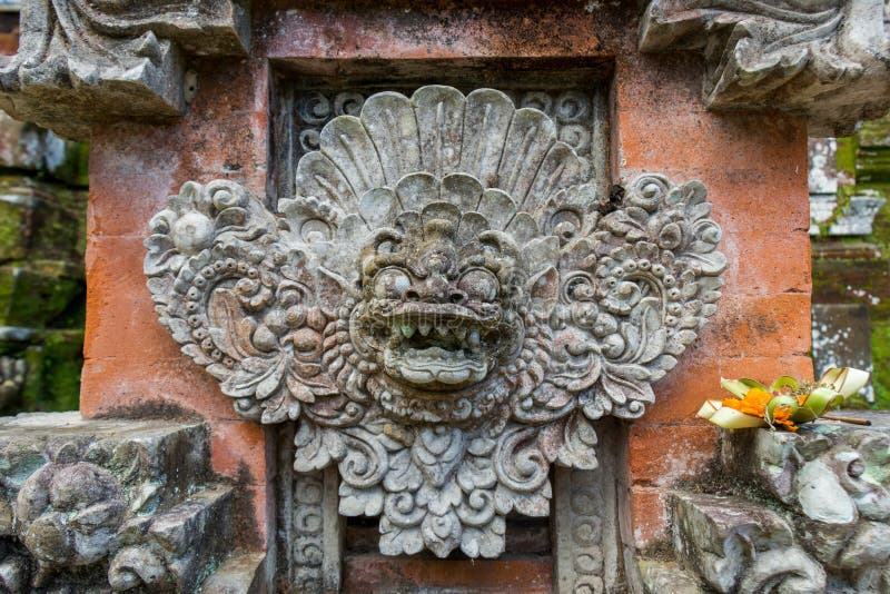 Ornate column in formal Balinese garden stock images Ornate column in formal Balinese garden stock images