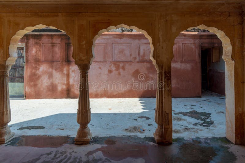 Ornate columns in a building, Amber Fort, Amer , Rajasthan, India .A narrow 4WD road leads up to the entrance gate, known as the Suraj Pol (Sun Gate) of the fort. It is now considered much more ethical for tourists to take jeep rides up to the fort, instead of riding the elephants. Amer Fort or Amber Fort is a fort located in Amer, Rajasthan, India. Amer is a town with an area of 4 square kilometres (1.5 sq mi) located 11 kilometres (6.8 mi) from Jaipur, the capital of Rajasthan. Located high on a hill, it is the principal tourist attraction in Jaipur. Amer Fort is known for its artistic style elements. With its large ramparts and series of gates and cobbled paths, the fort overlooks Maota Lake which is the main source of water for the Amer Palace. Ornate columns in a building, Amber Fort, Amer , Rajasthan, India .A narrow 4WD road leads up to the entrance gate, known as the Suraj Pol (Sun Gate) of the fort. It is now considered much more ethical for tourists to take jeep rides up to the fort, instead of riding the elephants. Amer Fort or Amber Fort is a fort located in Amer, Rajasthan, India. Amer is a town with an area of 4 square kilometres (1.5 sq mi) located 11 kilometres (6.8 mi) from Jaipur, the capital of Rajasthan. Located high on a hill, it is the principal tourist attraction in Jaipur. Amer Fort is known for its artistic style elements. With its large ramparts and series of gates and cobbled paths, the fort overlooks Maota Lake which is the main source of water for the Amer Palace.