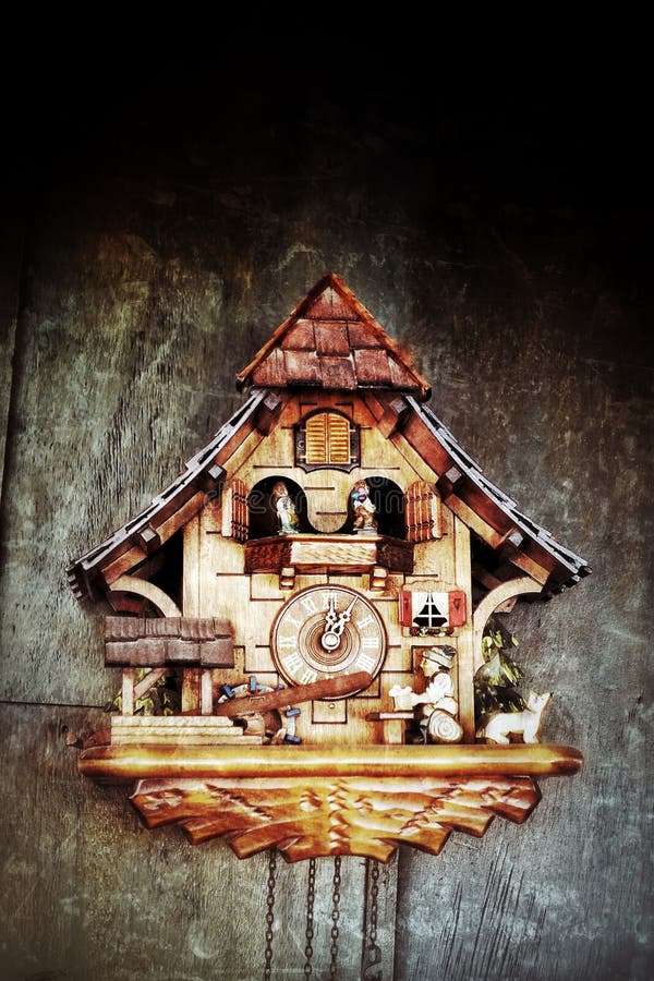 Orologio di parete di legno degli uccelli immagini stock Orologio di parete di legno degli uccelli immagini stock