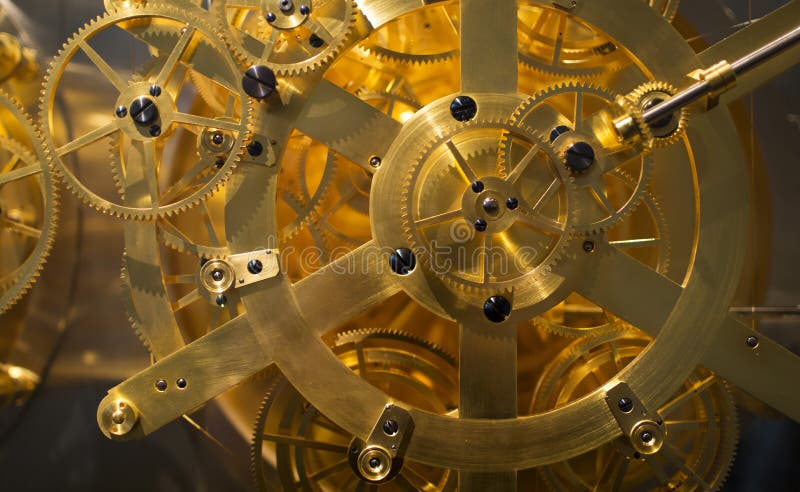 Golden clock mechanism close-up. Golden clock mechanism close-up.