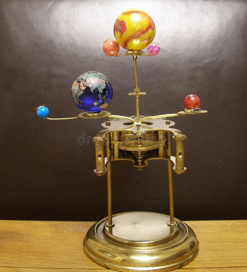 Orrery steampunk art clock with planets of the solar system.