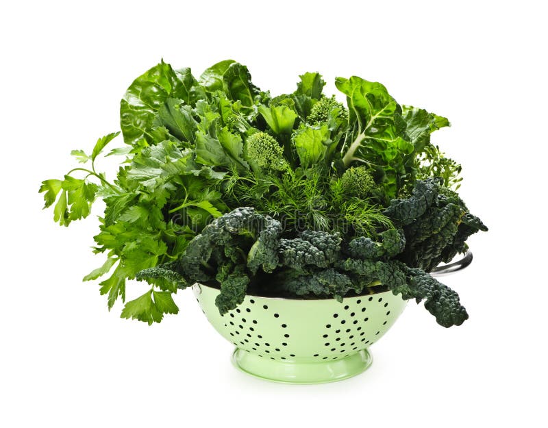 Ortaggi freschi verde scuro in colander fotografia stock libera da diritti