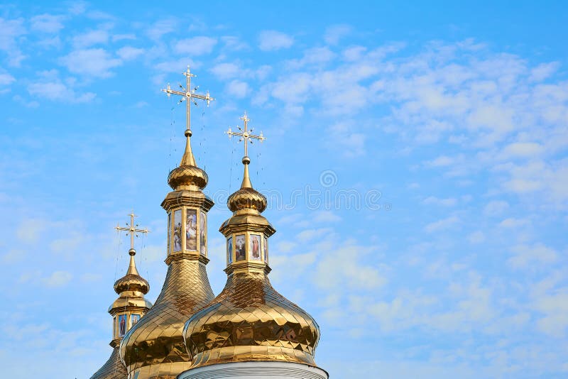 Religious building, Orthodox Christian cathedral with golden domes. Cathedral of the Holy Spirit. Romny, Sumska oblast, Ukraine