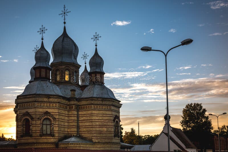 Orthodox church at sunset in the city landscape stock image Orthodox church at sunset in the city landscape stock image