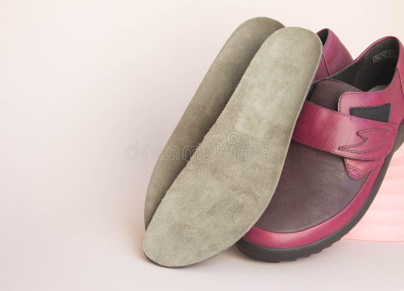 Orthopedic Insoles with Orthopedic Shoes. Accessories for the