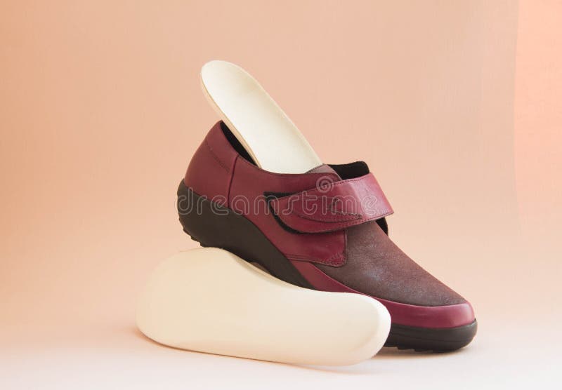 Orthopedic Insoles with Orthopedic Shoes. Accessories for the
