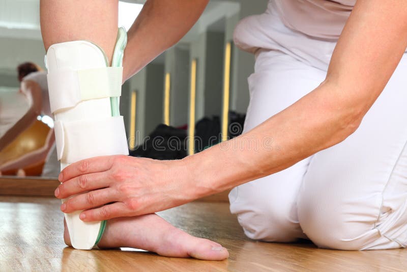 Orthopedist with Patient and Ankle orthosis