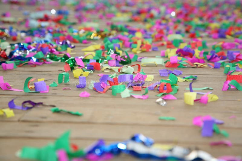 A background of confetti and streamers thrown. Party abstract confetti. Colorful paper confetti. Concept, colorful streamers, text boxes on a wooden floor. Colrful party background with streamers, confetti. Bright, colorful party streamers and confetti. Rainbow colored confetti background texture. A background of confetti and streamers thrown. Party abstract confetti. Colorful paper confetti. Concept, colorful streamers, text boxes on a wooden floor. Colrful party background with streamers, confetti. Bright, colorful party streamers and confetti. Rainbow colored confetti background texture.