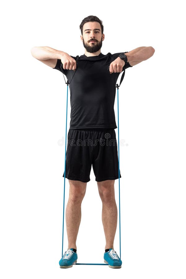 Os jovens couberam o ombro atlético do homem que exercita com as faixas da resistência imagem de stock Os jovens couberam o ombro atlético do homem que exercita com as faixas da resistência imagem de stock