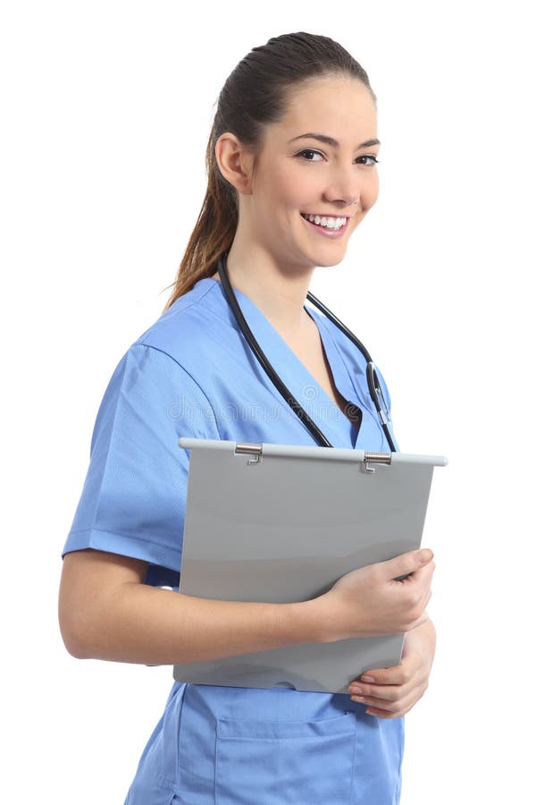 Young intern nurse student posing and holding a medical history isolated in a white background. Young intern nurse student posing and holding a medical history isolated in a white background