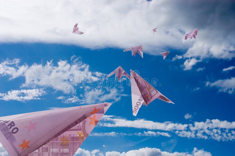 Five paper planes from 500 Euro banknotes fly away in sky. Five paper planes from 500 Euro banknotes fly away in sky