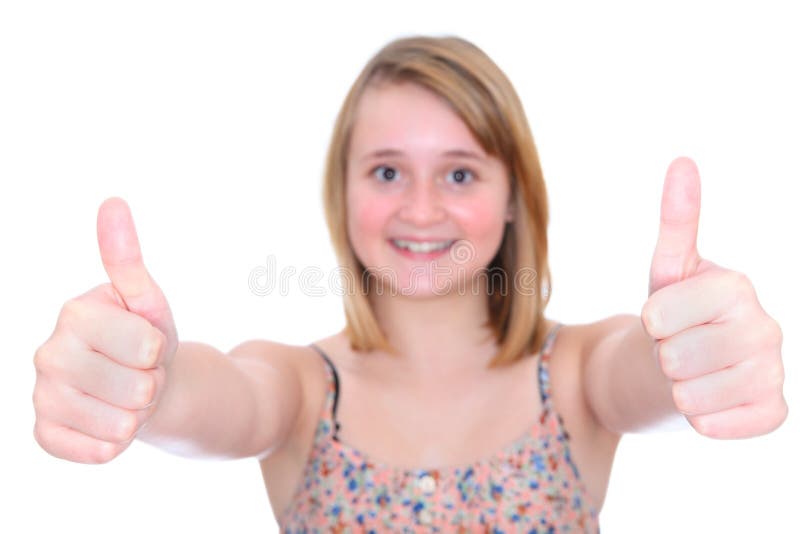 Os polegares levantam a menina adolescente imagens de stock Os polegares levantam a menina adolescente imagens de stock
