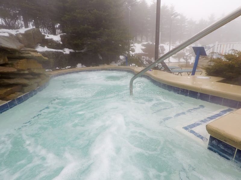 Outdoor hot tub spa and pool in winter season. Outdoor hot tub spa and pool in winter season
