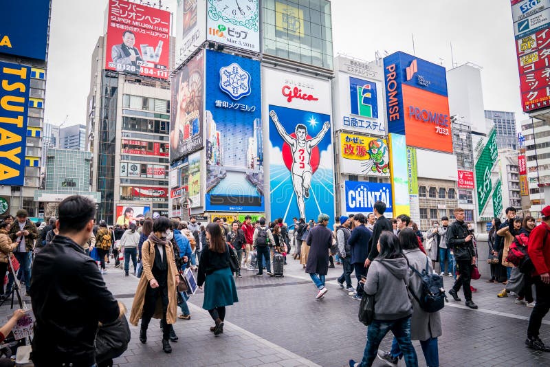 Osaka, Japon - 3 mars 2018 : Le panneau d'affichage numérique de signage d'homme de Gulico est le point de repère populaire/attra photos stock Osaka, Japon - 3 mars 2018 : Le panneau d'affichage numérique de signage d'homme de Gulico est le point de repère populaire/attra photos stock