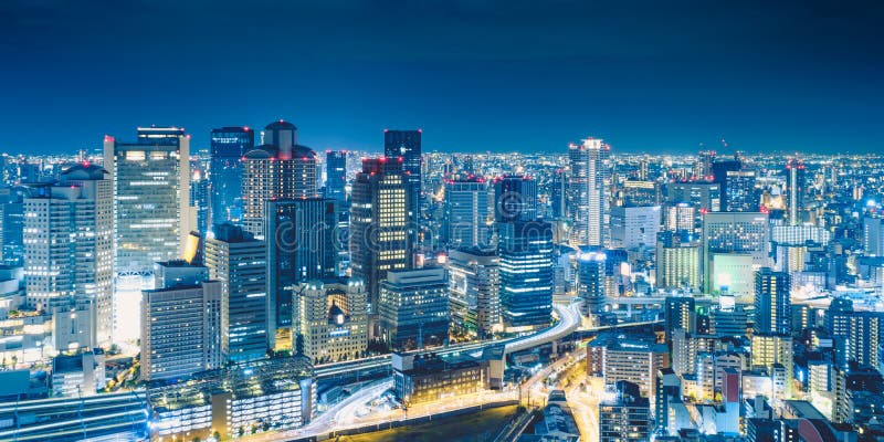 Osaka Night View dalla costruzione del cielo di Umeda in Kita Ward, Osaka, Giappone fotografia stock libera da diritti Osaka Night View dalla costruzione del cielo di Umeda in Kita Ward, Osaka, Giappone fotografia stock libera da diritti