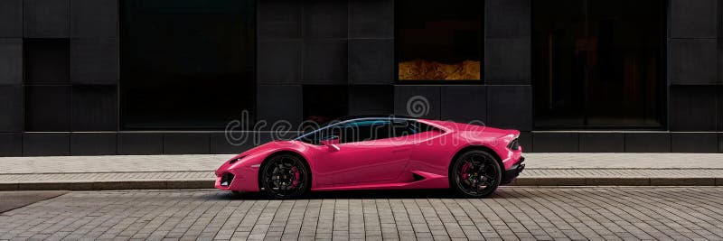 Oslo / Norway 06.03.2016: Pink Lamborghini Huracan in front of office building on Wismargata street. Oslo / Norway 06.03.2016: Pink Lamborghini Huracan in front of office building on Wismargata street